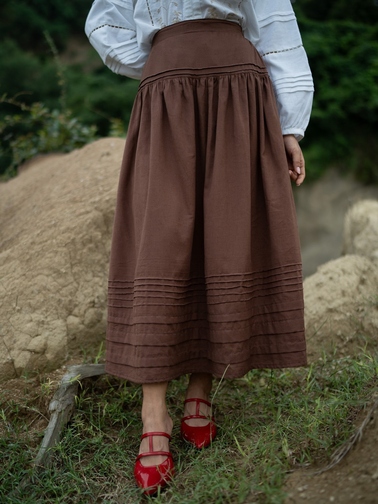 Every pleat counts ~ our caia hand pleated skirt in mocha brown shade 

www.urnam.com